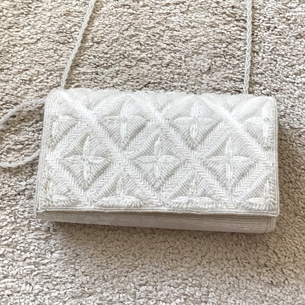 White beaded clutch with strap